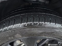 This 2023 Buick Envision Essence SUV is a head-turner, boasting a sleek Moonstone Grey Metallic exte... (image 9)