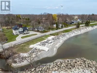 Custom-Built waterfront home- extraordinary comfort by the Lake. Nestled along the shores of Lake Er...