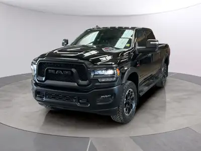 The 2023 Ram 2500 Rebel in black is a force to be reckoned with, offering a versatile 4x4 drivetrain...