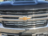 Experience rugged power and refined comfort with this lightly used 2021 Chevrolet Silverado 1500 LTZ... (image 8)