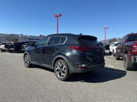 Navigate city streets and conquer daily commutes with ease in the 2020 Kia Sportage EX. This sporty... (image 4)