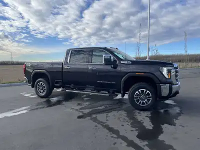 AMVIC Licensed Dealer The 2026 GMC Sierra 2500HD SLT 4WD combines bold design, high-end comfort, and...