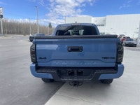 AMVIC Licensed Dealer The 2018 Toyota Tacoma TRD Off Road 4x4 Double Cab, finished in Blazing Blue M... (image 7)