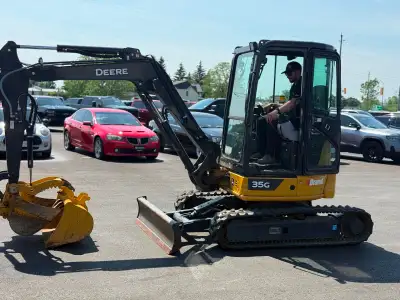 Local trade. Clean unit. All functions work as they should on a new machine. Comes with Ditching buc...