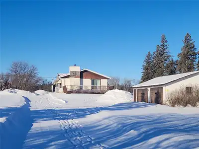 R19//Fisher Branch/Nestled on a beautiful 19.38 acre treed lot, this home is ready for you to make i...