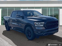 This 2021 Ram 1500 Sport Crew Cab, striking in Granite Crystal Metallic, stands ready for action, bo... (image 6)