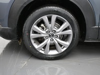 The 2024 Mazda CX-5 GS is praised for its fun driving experience, engaging performance, and high-qua... (image 4)