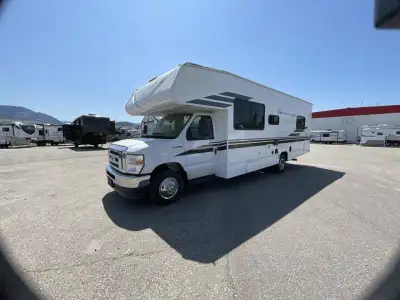 Coachmen Freelander Class C gas motorhome 27QB highlights: Rear Bedroom Bunk Over Cab 42in.in. x 71i...