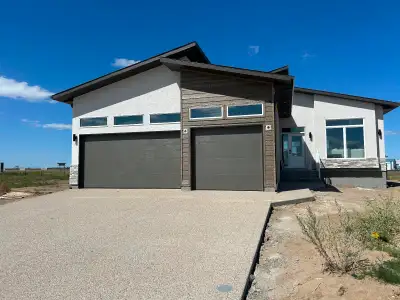 This brand new 1303 sq.ft. Crawford Homes bungalow has a large open main floor, 3 bedrooms, 2 full b...