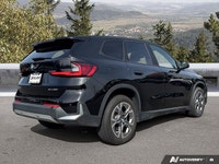 Command attention and experience agile driving in the 2025 BMW X1 xDrive28i. This dynamic Sport Util... (image 4)