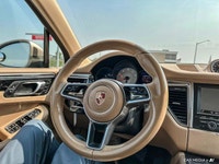 The 2015 Porsche Macan comes equipped with all-wheel drive, heated leather seats, a heated steering... (image 8)