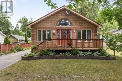 A home so close to the beach you can hear & see the waves! Spacious home on a 50 x 175 ft. lot, this...