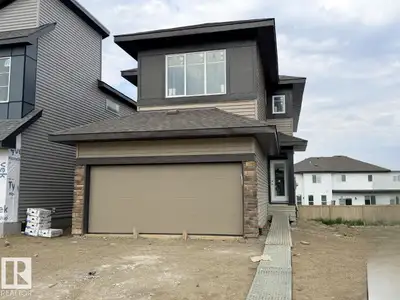 Discover this stunning 2026-built, 1,996 sq ft home in Legacy Ridge, Spruce Grove — just minutes fro...