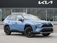 The highly anticipated 2025 Toyota RAV4 Hybrid XSE, a striking light blue Sport Utility with a sophi... (image 7)