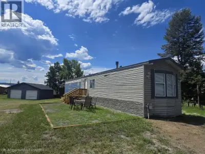 Located in the heart of Lac La Hache, this updated 2 bed, 2 bath mobile home sits on 0.44 acres and...