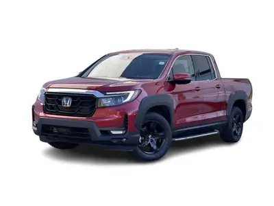 Our 2023 Honda Ridgeline Touring in Radiant Red Metallic is a local lease return! This vehicle is in...