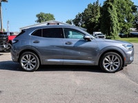 Experience the elegance and sophistication of the 2021 Buick Envision Avenir in a stunning gray exte... (image 2)