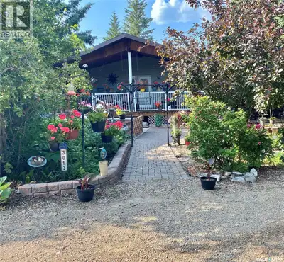 Welcome to your perfect year-round waterfront retreat—where comfort, functionality, and lake life co...