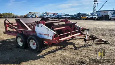 ROCK-O-MATIC 57 Tandem Axle 78 inch Paddle Rock Picker 7 Ft working width 540 PTO driven 30 inch roc...