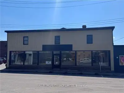 Commercial Opportunity including a 6000 square foot Retail/Warehouse Building and Adjacent Parking L...