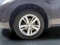 The 2015 Acura RDX in striking AWD configuration boasts an impressive handling prowess. This sophist... (image 8)