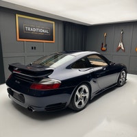 Check out this 2003 Porsche 911 Twin Turbo. This is the very desirable Midnight Blue Metallic with N... (image 3)