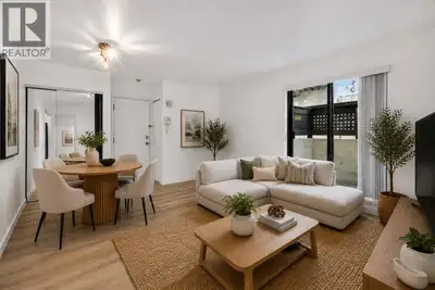 Welcome to this quiet, corner garden home located on a serene, tree-lined street in the heart of Mar...