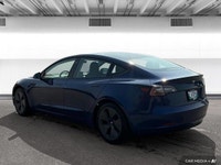 The 2021 Tesla Model 3 offers LED auto-leveling headlights, a panoramic sunroof, and aluminum wheels... (image 2)