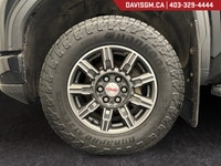The 2024 GMC Sierra 1500 AT4 Crew Cab Short Box 4WDblends premium craftsmanship, rugged off-road cap... (image 8)