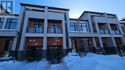 Welcome to the Executive Townhome in the trendy new neighborhood of Upscale Oakville. Beautiful pond...