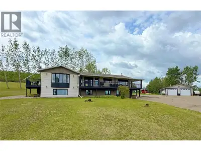 Just four minutes from Dawson Creek, this remarkable 5.1-acre private estate offers over 4,200 sq. f...