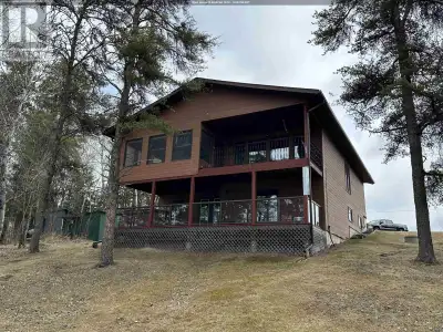 This year-around road access home offers spectacular views of Locke Bay with 250' of frontage on the...