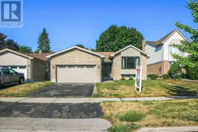 Welcome to 1876 New Street - a bright and beautifully updated bungalow with a double car garage, nes...