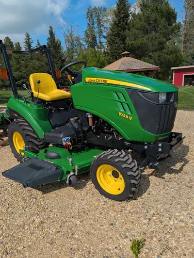 John Deere 1023E with ONLY 60hrs, and 60" mowing deck, View more