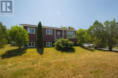 Fully developed split-entry home with in-law suite, ideally located in scenic Portugal Cove!! The br...