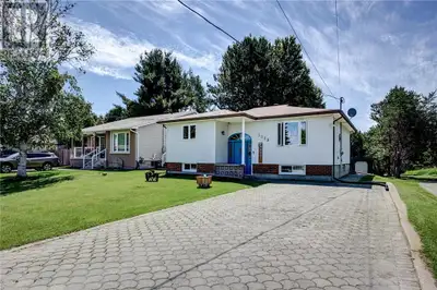 Lovely split entry bungalow in a great Valley neighborhood. This three bedroom and two bathroom home...
