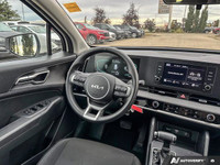 Experience the confident handling and everyday practicality of this 2023 Kia Sportage LX AWD. Boasti... (image 9)