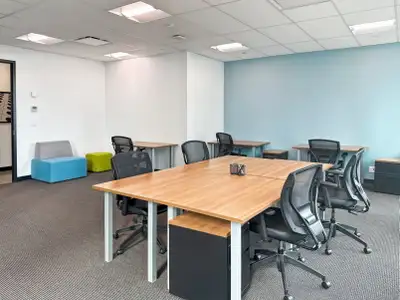 Flexible large office for rent designed to accommodate 25 people at Regus Calgary Place. A fully ser...