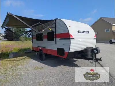 Sunset Park RV Sun Lite 18RD travel trailer highlights: Front Murphy-Style Bed Booth Dinette Private...