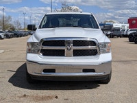 This pre-owned 2023 Ram 1500 Classic SLT Crew Cab is finished in Bright White with a clean Black and... (image 9)
