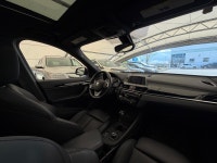 The 2018 X1 xDrive28i serves as a versatile "Sports Activity Vehicle" SAV tailored for urban environ... (image 6)