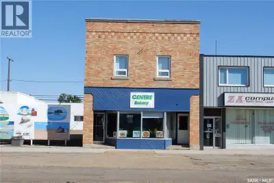 Located in Assiniboia, this property offers retail space on the ground floor and two updated two-bed...