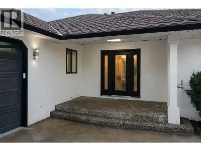 Stunning Walk-Out Rancher with Lake Views & Legal Suite. It’s all about location & breathtaking lake...