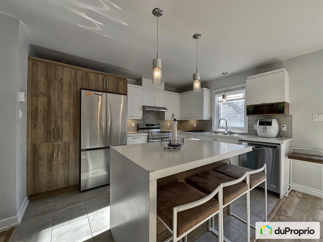 $499,999 - Townhouse for sale in St-Rémi — photo 1
