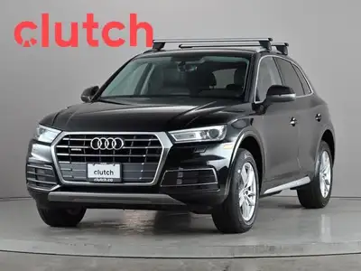 Power Tailgate/Hatch, Auto Dimming Rearview Mirror, Front Heated Seats and more! Clutch is the large...