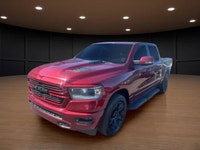 Introducing the stunning red 2023 Ram 1500 Sport 4x4 Crew Cab 5'7" Box, designed to handle the road... (image 1)