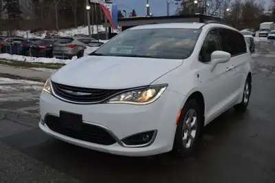 Price reduced to $18,950! Clean Carfax, Plug in hybrid, Well maintain, 7 passengers seating, navigat...