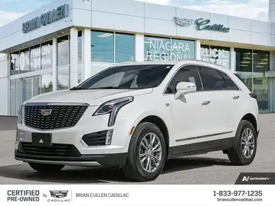 Introducing the pristine 2022 Cadillac XT5 AWD Premium Luxury in an elegant white exterior, compleme...