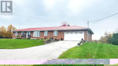 Beautifully updated 4-bedroom brick bungalow on 50.90 acres (House + Heated Quonset Hut + Farmland)...
