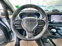 This 2023 Chrysler Pacifica Touring FWD has the V6 3.6L erc - Gas engine with a 9 Speed Automatic tr... (image 8)